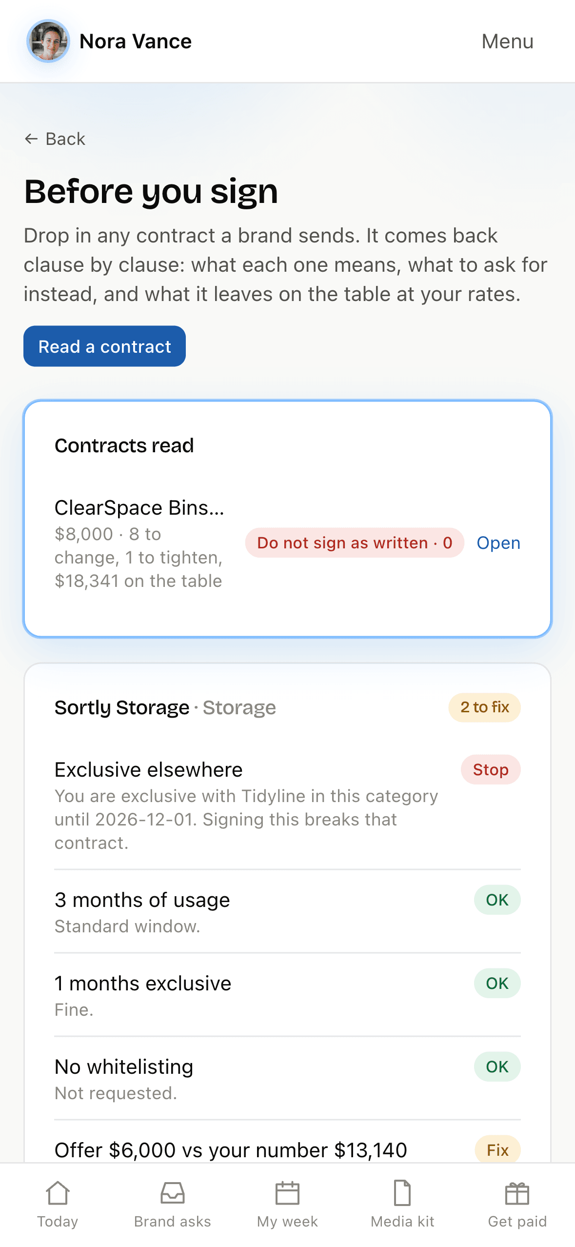 Before you sign in Creator OS: each clause of a brand contract checked and marked OK or Fix